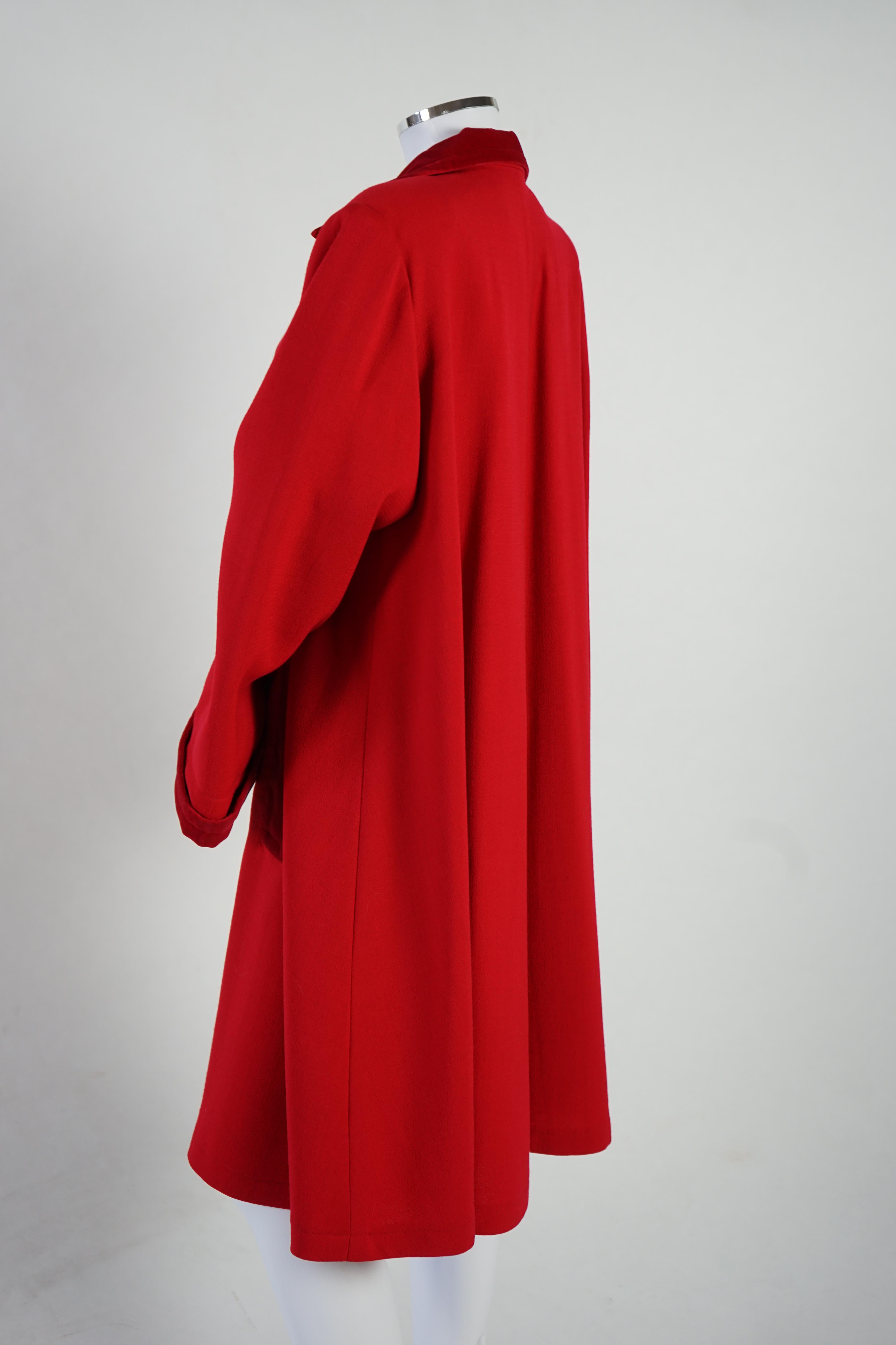 A vintage Yves Saint Laurent variation lady's red wool coat with velvet trim, F 40 (UK 12). Proceeds to Happy Paws Puppy Rescue
